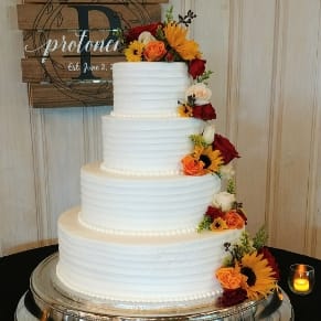 Photo of a Mrs Pumpkins custom wedding cake